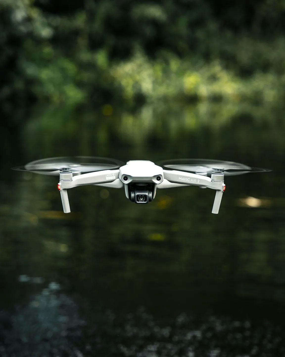 Drone flying above residential roof during inspection